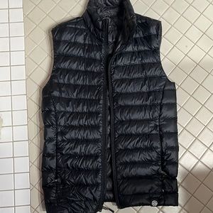 Black REI Women’s Insulated Vest with zipper pockets